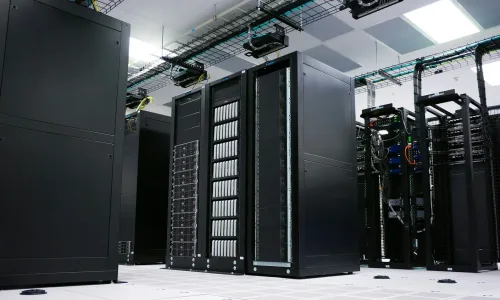 Rows of server racks in a data center